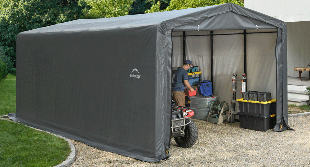 man inside a portable garage